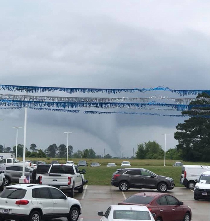 A funnel-shaped cloud is seen Saturday afternoon near Interstate 30 in Texarkana, Texas.  (Photo courtesy of  Cody Trudeau and Ralf Balof)
