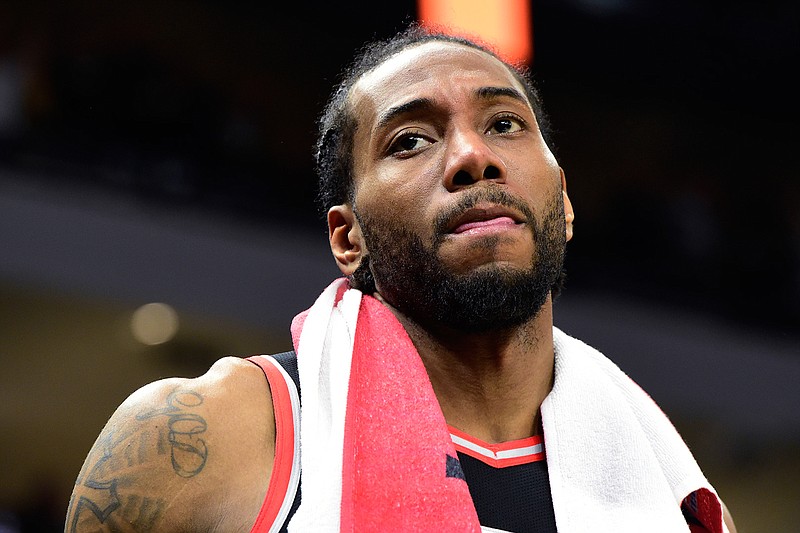 Toronto Raptors forward Kawhi Leonard reacts at the end of Game 2 of the team's NBA basketball playoffs Eastern Conference finals against the Milwaukee Bucks, Friday, May 17, 2019, in Milwaukee. (Frank Gunn/The Canadian Press via AP)