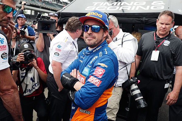 Fernando Alonso watches the final qualifier during Sunday's qualifications for Indianapolis 500 at Indianapolis Motor Speedway in Indianapolis. Alonzo failed to make the field for the race.