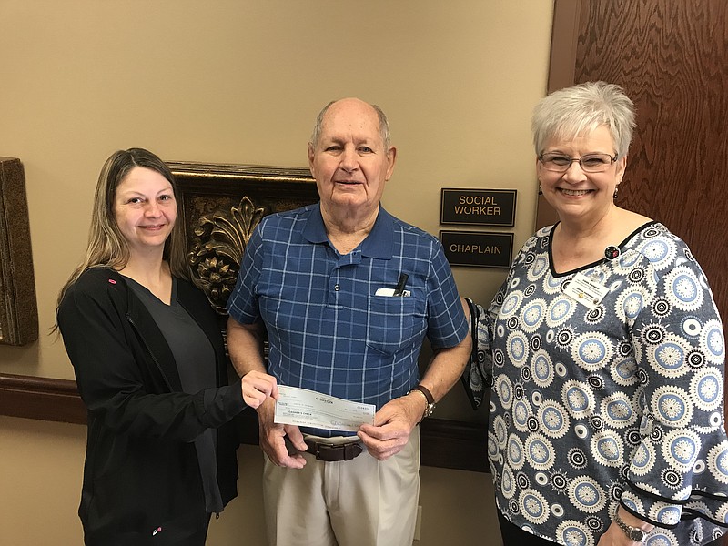 Max Duren recently donated $10,000 Hospice of Texarkana to name an office at the Hospice of Texarkana Care Center for his wife. The name of the office will be The Lena Duren Social Worker/Chaplain Office. Pictured, from left, are Brett Nolte, social worker, Max Duren and Chaplain Amy Goodroe.