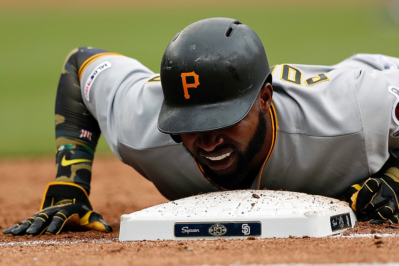 Pittsburgh Pirates' Gregory Polanco reacts after getting picked off at first base during the third inning Sunday against the San Diego Padres in San Diego.