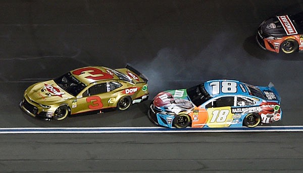 Austin Dillon spins after contact from Kyle Busch during Saturday night's NASCAR All-Star Race at Charlotte Motor Speedway in Concord, N.C.