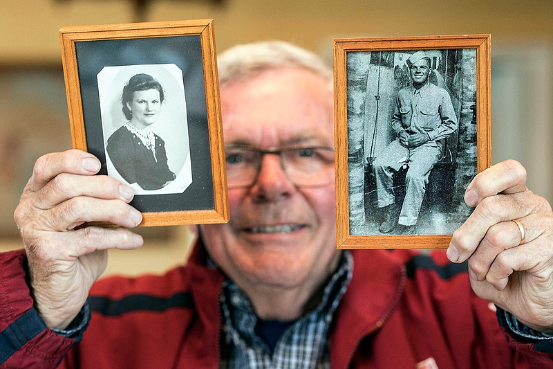 Andre Gantois shows photos on May 8, 2019, of his parents, Wilburn Henderson, right, and mother Irene Gantois in Ludres, eastern France. Wilburn Henderson landed on Omaha beach just after D-Day, fought through Normandy, suffered a head wound in the closing months of the war and met Irene Gantois at a hospital in occupied Germany. 