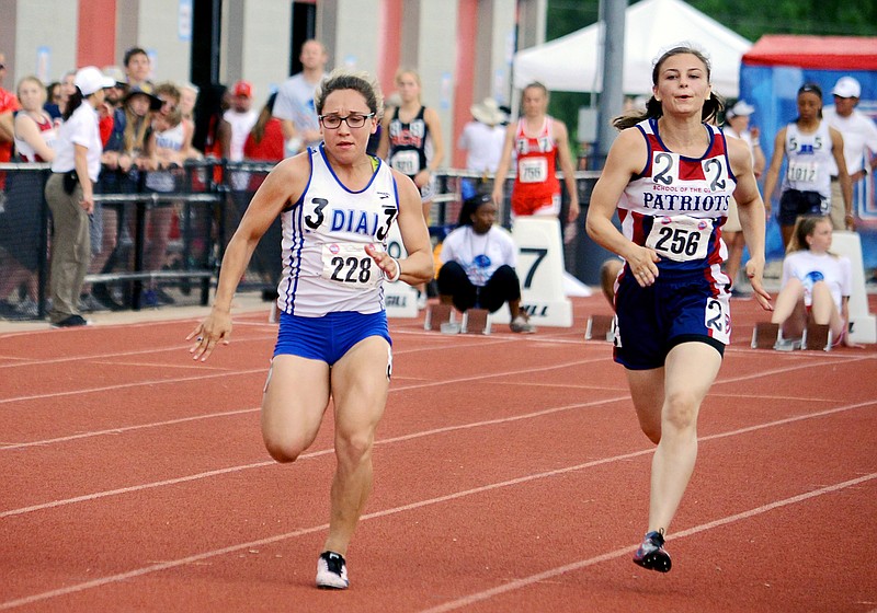 Russellville senior Makenzie Schwartz races in the girls 100-meter dash final Saturday, May 18, 2019, in the Class 1 state track and field championships at Adkins Stadium in Jefferson City.