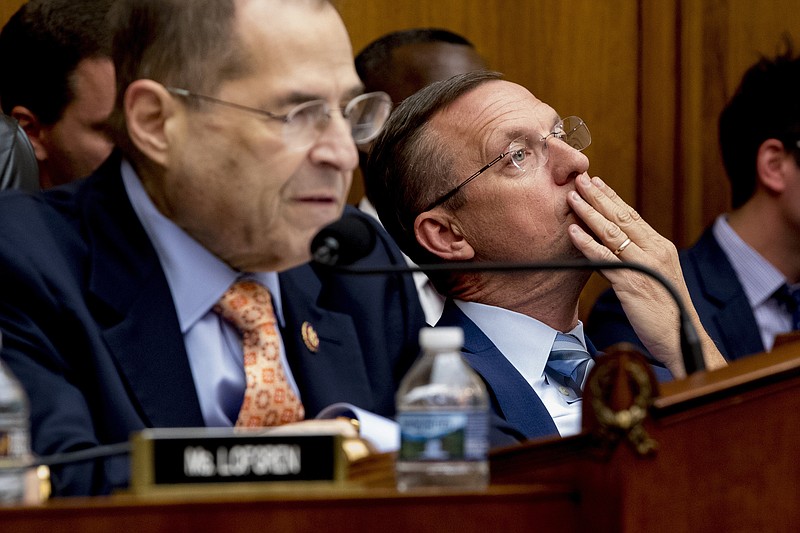 Ranking Member Rep. Doug Collins, R-Ga., right, listens as Judiciary Committee Chairman Jerrold Nadler, D-N.Y., left, speaks at a House Judiciary Committee hearing without former White House Counsel Don McGahn, who was a key figure in special counsel Robert Mueller's investigation, on Capitol Hill in Washington, Tuesday, May 21, 2019. President Donald Trump directed McGahn to defy a congressional subpoena to testify but the committee's chairman, Rep. Jerrold Nadler, D-N.Y., has threatened to hold McGahn in contempt of Congress if he doesn't appear. (AP Photo/Andrew Harnik)