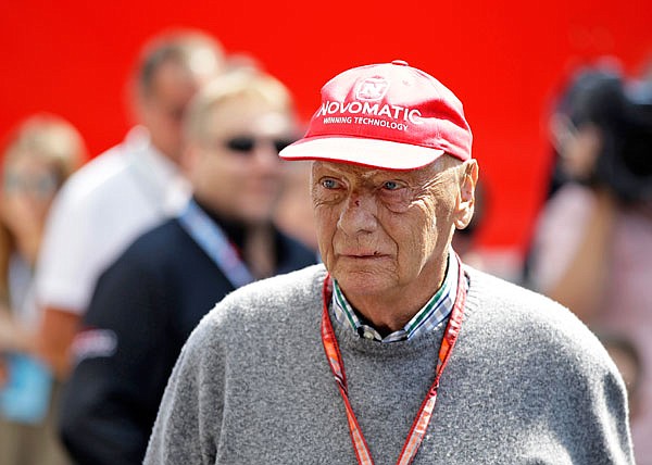 In this July 7, 2018, file photo, former Formula One world champion Niki Lauda walks in the paddock before the third free practice at the Silverstone racetrack in Silverstone, England.