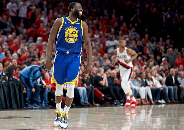 Warriors forward Draymond Green reacts after making a basket against the Trail Blazers during Game 4 of the Western Conference finals Monday in Portland, Ore.