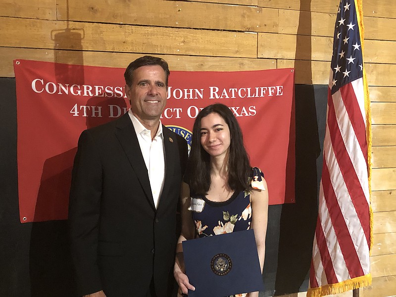 U.S. Rep John Ratcliffe, left, poses for a photo with student Hannah Klein. Klein, a senior at Texas High School, will attend the U.S. Naval Academy in Annapolis, Md. (Submitted photo)
