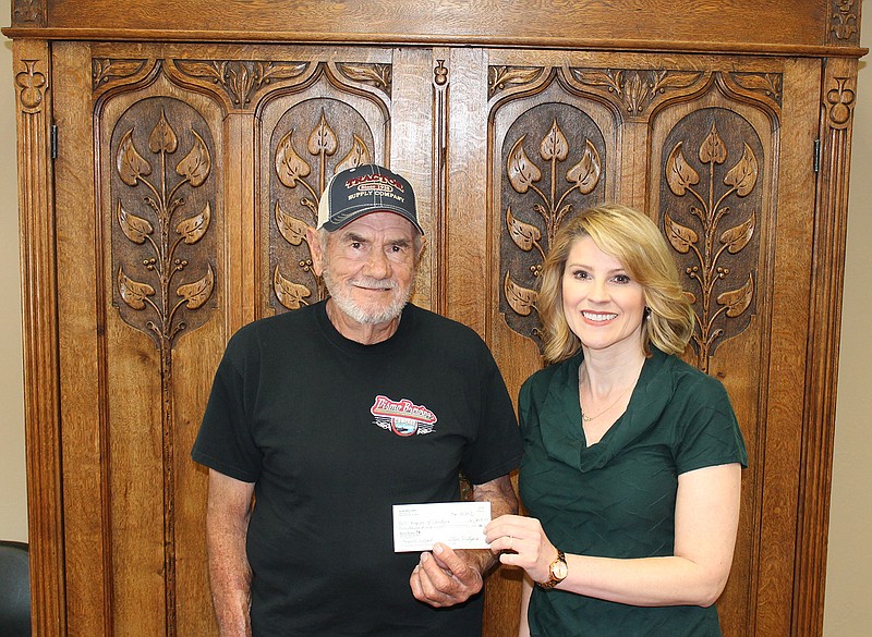 Hospice of Texarkana recently received a $1,000 donation from Glen Willyard in memory of his wife, Margarite "Maggie" Willyard. The money will be used for the Hospice of Texarkana Care Center. Pictured, from left, are Glen Willyard and Stefanie Brazile, Hospice of Texarkana director of development and public relations.  (Submitted photo)