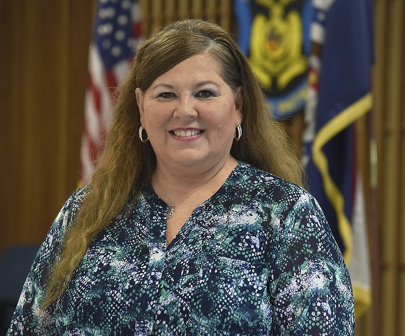 
Carla Flickinger poses in the large conference room at the Missouri Highway Patrol. She will be retiring after 38 years at the public safety agency.