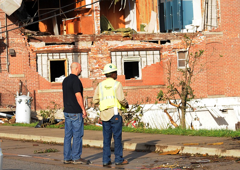 Mark Wilson/News Tribune
A crew from Ameren size up tornado damage on Lafayette near the Missouri State Penitentiary May 25, 2019. The tornado occurred during the May 22 night storm that rolled through town.