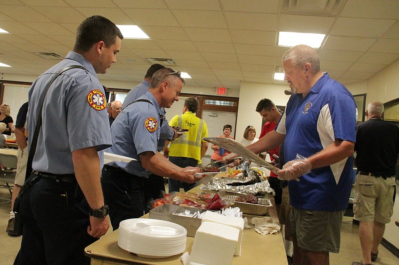 Local Knights of Columbus and family members hosted a free meal for local first responders at the Knights of Columbus Fr. Helias Council 1054's hall on Tanner Bridge Road, a short distance from some of the heavy damage in Jefferson City from the May 22 tornado.