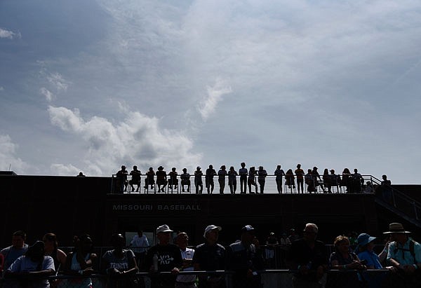 Spectators line up to watch events from above at Taylor Stadium as athletes compete in the Class 3 state track and field championships Saturday at Walton Stadium in Columbia.