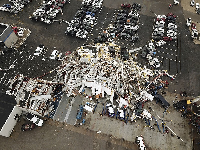 This aerial image shows severe storm damage in Jefferson City, Mo., Thursday, May 23, 2019, after a tornado hit overnight. A tornado tore apart buildings in Missouri's capital city as part of an overnight outbreak of severe weather across the state. (DroneBase via AP)