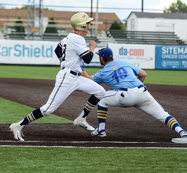 Helias' Zach Woehr tries to beat the throw to Borgia first baseman Spencer Hunter during Thursday's Class 4 semifinal game at CarShield Field in O'Fallon.