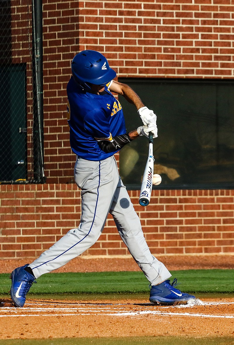 James Bowie center fielder Dalton McBride hits a ground ball to left field during the Pirates' Region III-2A championship game against the Linden-Kildare Tigers on Friday at Texas High School.