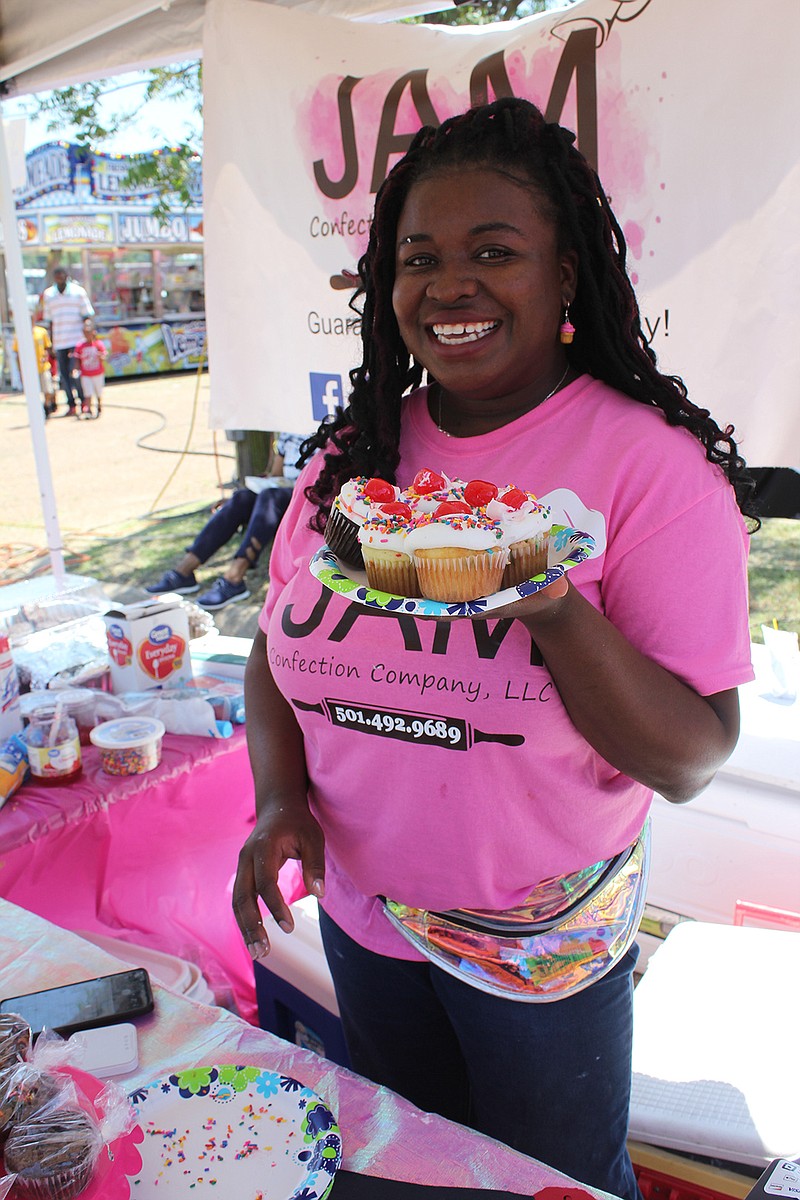 De Jeune Kinchen of Jam Confection Company shows off her creations that won her a world record in cupcake decorating in the Guinness Book of World Records, successfully breaking the previous record of decorating six cupcakes in 47 seconds with a time of 39.1 seconds.