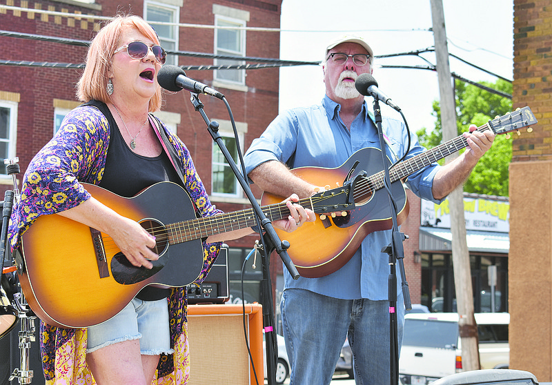 Abigail Rose and Dennis Layne Schubert were one of 15 bands or individual musicians who performed during Sunday's Jam for Jefferson City on High Street. The day of music raised money for tornado relief efforts.