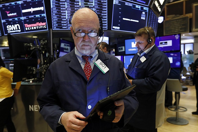 FILE - In this May 30, 2019, file photo trader John Doyle works on the floor of the New York Stock Exchange. U.S. stocks headed broadly higher in early trading Tuesday, June 4, on Wall Street after comments from Mexico's foreign minister injected some optimism into a developing trade dispute. (AP Photo/Richard Drew, File)