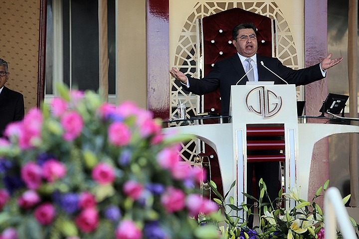  In this Aug. 9, 2018, photo, Naasn Joaqun Garca leads a service at his church "La Luz del Mundo" in Guadalajara, Mexico. Garcia, the leader and self-proclaimed apostle of La Luz del Mundo, a controversial church that claims over 1 million followers, has been charged with human trafficking and child rape, California authorities said on Tuesday, June 4, 2019. (AP Photo)