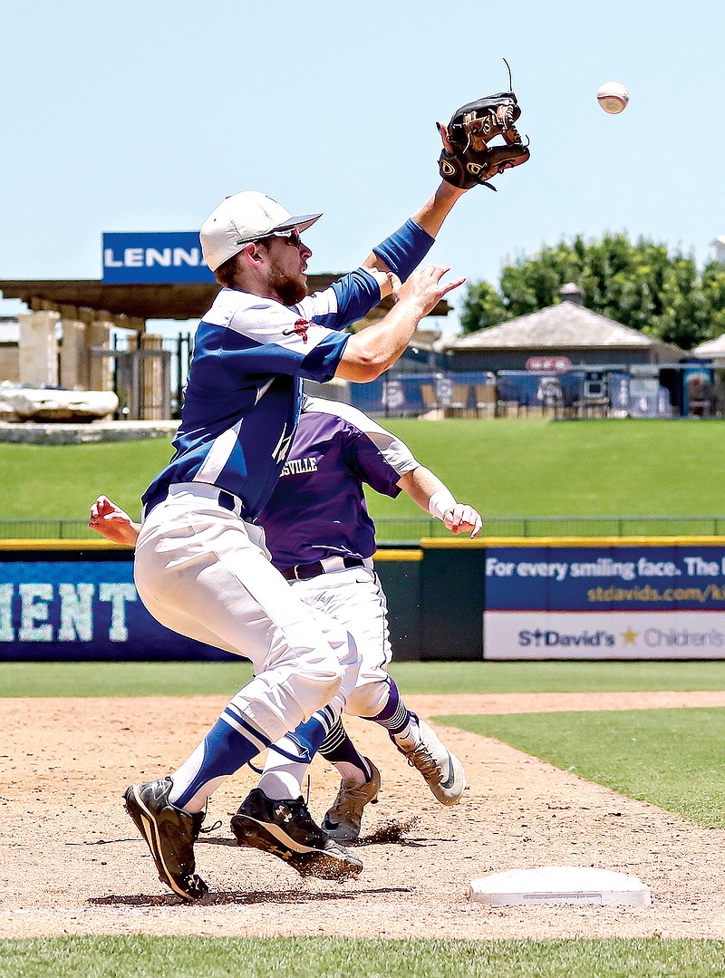 Linden-Kildare Tigers third baseman Jacob Owen catches the ball for an out before a Dallardsville Big Sandy Wildcats runner can reach the base during the Class 2A state championship on Thursday, June 6, 2019, at Dell Diamond in Round Rock, Texas. The Tigers lost, 1-7.