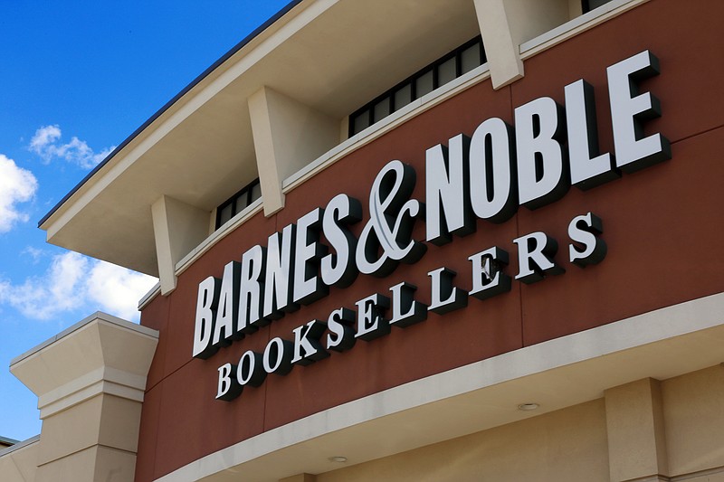 FILE - This Aug. 31, 2017 file photo, shows a Barnes and Noble Booksellers store in Pittsburgh.  The beleaguered bookseller is being sold to Elliott Management Corp. in a $476 million deal. Elliott will pay $6.50 per share. That’s an approximately 9% percent premium to the company’s Thursday closing price of $5.96. The transaction is valued at about $683 million, including debt. (AP Photo/Gene J. Puskar, File)