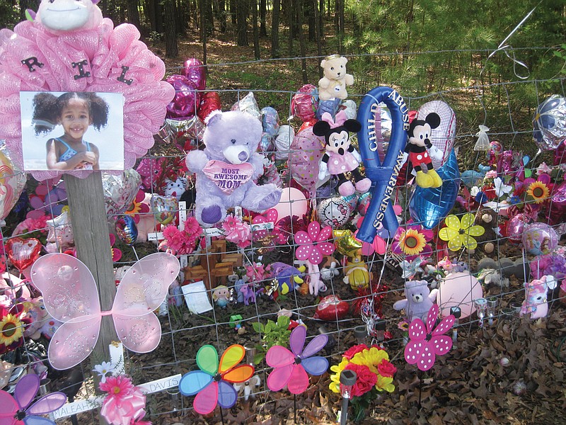 Mourners leave stuffed toys and other love offerings near Fulton, Ark., at a memorial wall created for slain 4-year-old Maleah Davis of Houston. 