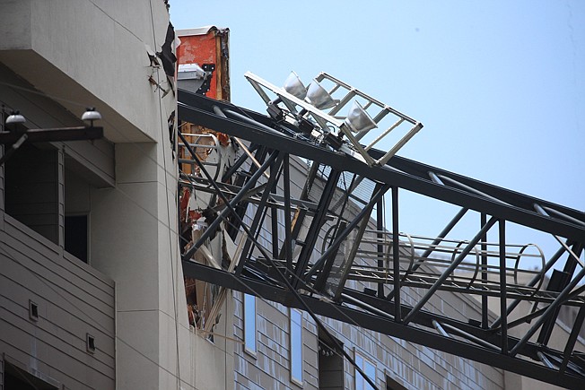  A crane collapsed Sunday into Elan City Lights apartments amid severe thunderstorms in Dallas. Injuries were reported Sunday afternoon when storms pummeled parts of North Texas.