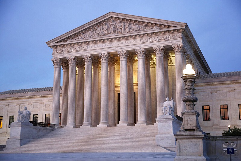 In this May 23, 2019, photo, the U.S. Supreme Court building is seen at dusk on Capitol Hill in Washington. (AP Photo/Patrick Semansky)