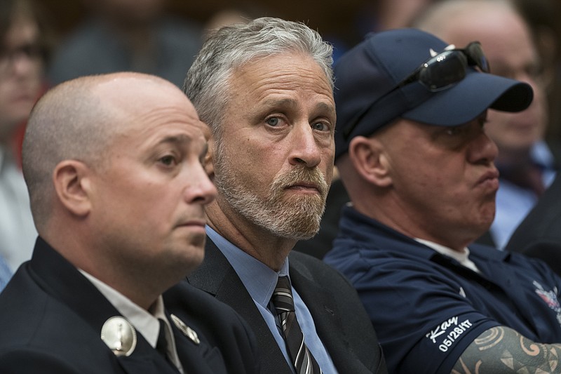 Entertainer and activist Jon Stewart lends his support to firefighters, first responders and survivors of the September 11 terror attacks at a hearing by the House Judiciary Committee as it considers permanent authorization of the Victim Compensation Fund, on Capitol Hill in Washington, Tuesday, June 11, 2019. (AP Photo/J. Scott Applewhite)