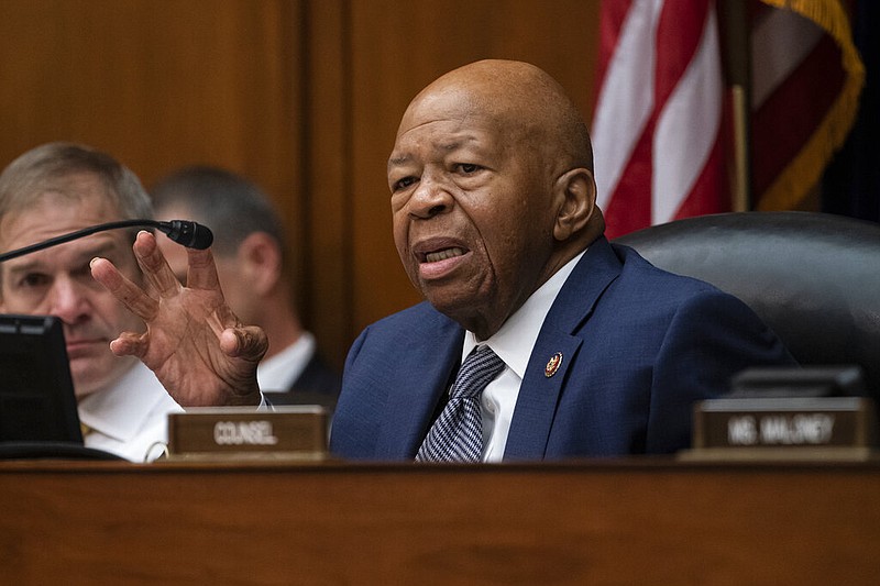 House Oversight and Reform Committee Chairman Elijah E. Cummings, D-Md., joined at left by Rep. Jim Jordan, R-Ohio, the ranking member, considers whether to hold Attorney General William Barr and Commerce Secretary Wilbur Ross in contempt for failing to turn over subpoenaed documents related to the Trump administration's decision to add a citizenship question to the 2020 census, on Capitol Hill in Washington, Wednesday, June 12, 2019. 