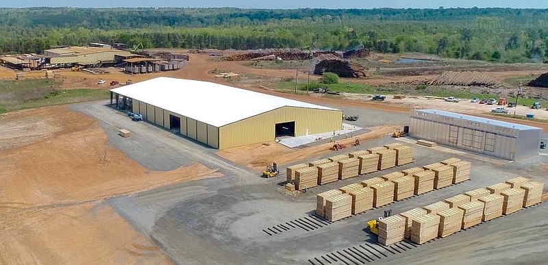 This aerial photo of Ward Timber Co. shows the new storage and dry kiln buildings in the foreground and the hardwood-cutting and stacking buildings in the background. (Submitted photo)
