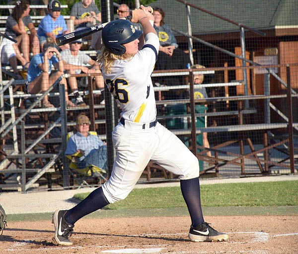 Gaven Strobel of the Renegades makes contact on a pitch during Tuesday night's MINK League game against the Mustangs at Vivion Field. 