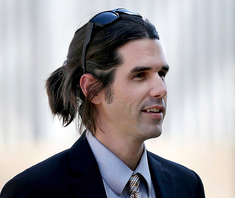 In this 2018 file photo, Scott Daniel Warren, who is charged with human smuggling, walks in to U.S. District Court in Tucson, Ariz. On Monday, June 10, 2019, a federal judge in Tucson ordered a jury to continue deliberations in the trial against Warren after the jury told the court Monday afternoon that it couldn't come to a consensus on the three charges against him. (Kelly Presnell/Arizona Daily Star via AP, File)
