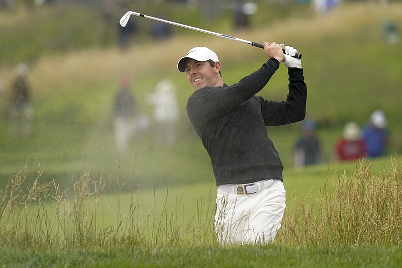 Rory McIlroy, of Northern Ireland, hits out of the bunker on the 10th hole during a practice round for the U.S. Open Championship golf tournament Wednesday, June 12, 2019, in Pebble Beach, Calif. 