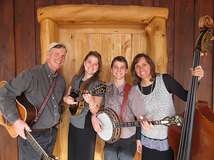  The Hartley Family Bluegrass Band from Arkadelphia, Ark., has been playing bluegrass and gospel music together since 2003. Pictured are Tom and Deb Hartley and their two youngest children, Abby and Micah. Submitted photo