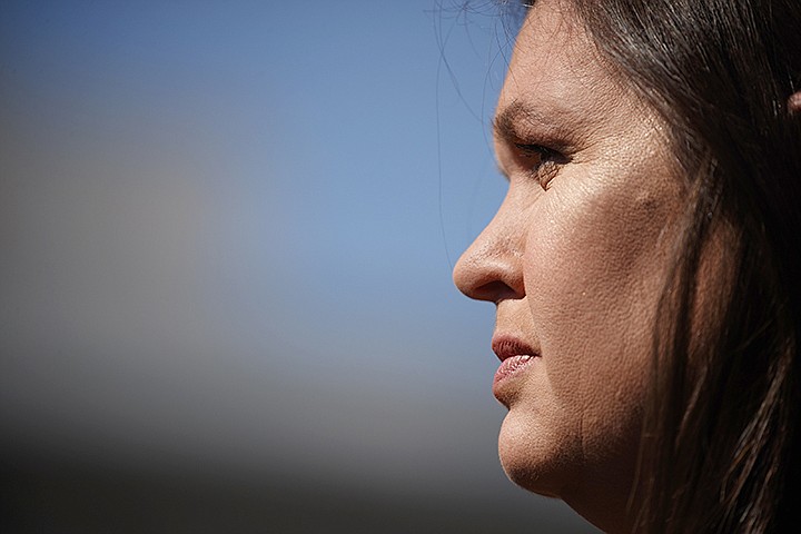  In this Friday, May 31, 2019, file photo White House press secretary Sarah Sanders talks to reporters outside the White House in Washington. The possibility that Sanders may run for governor in her home state of Arkansas is shaking up a race that's three years away but had already been expected to be a crowded and expensive fight among Republicans. President Donald Trump encouraged Sanders to run for governor when he announced her departure as press secretary on Thursday. (AP Photo/Evan Vucci, File)