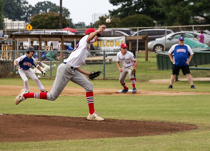 Texarkana Bulldogs' Hunter Allen fires a pitch to an East Texas Prospects batter during the opening game of the fourth annual Phil Sandoval Memorial baseball tournament Friday, June 14, 2019, at George Dobson Field in Texarkana, Texas.