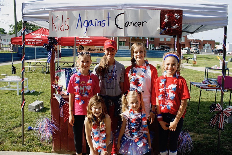 The Kids Against Cancer team are pictured, Back row from left, Ellie Beckmeyer, Ava Santhuff, Lauren Reicke and Isabelle Borcherding; front row from left Rose Blattner and Annalise Borcherding. This year's event happened to fall on Flag Day, so red, white and blue were in abundance.