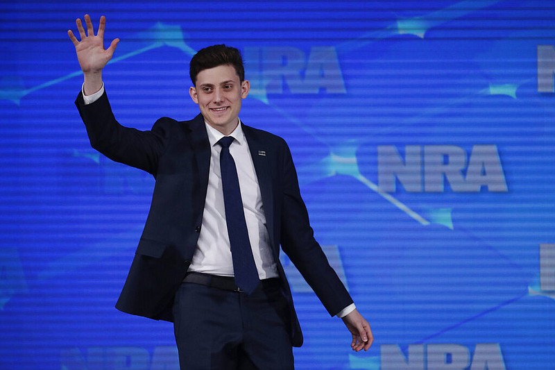 In this April 26, 2019 file photo, Kyle Kashuv, a survivor of the Marjory Stoneman Douglas High School shooting in Parkland, Fla., speaks at the National Rifle Association Institute for Legislative Action Leadership Forum in Indianapolis. On Monday, June 17, 2019, Kashuv said that Harvard University revoked his acceptance over racist comments he made online and in text messages about two years ago.