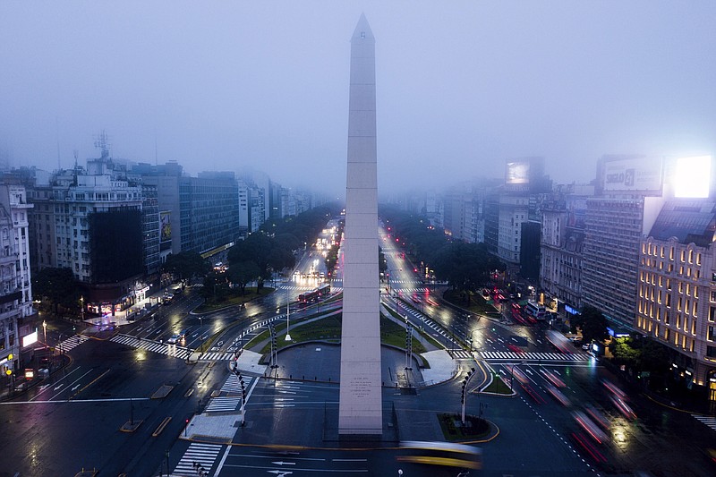 Cars drive on the 9 de Julio Ave, near the Obelisk monument in Buenos Aires, Argentina, early Monday morning, June 17, 2019. As lights turned back on across Argentina, Uruguay and Paraguay after a massive blackout that hit tens of millions people, authorities were still largely in the dark about what caused the collapse of the interconnected grid and were tallying the damage from the unforeseen disaster. (AP Photo/Tomas F. Cuesta)