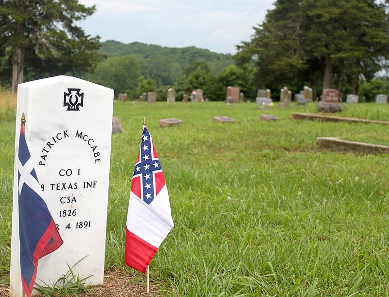 <p>Liz Morales/For the News Tribune</p><p>More than 100 years after his death, Confederate Army veteran Patrick McCabe received a grave stone June 15 at Old Salem Cemetery.</p>