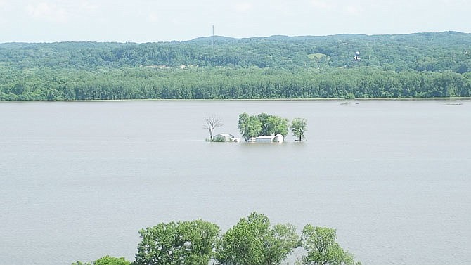 Callaway County Sheriff's Office drones captured outbuildings near Steedman standing like an island amid Missouri River floodwaters. Emergency management officials have asked those impacted by recent flooding to report the damage.