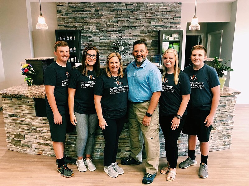 The Koelling family inside their new Jefferson City location. (Courtesy of Bryce Koelling)