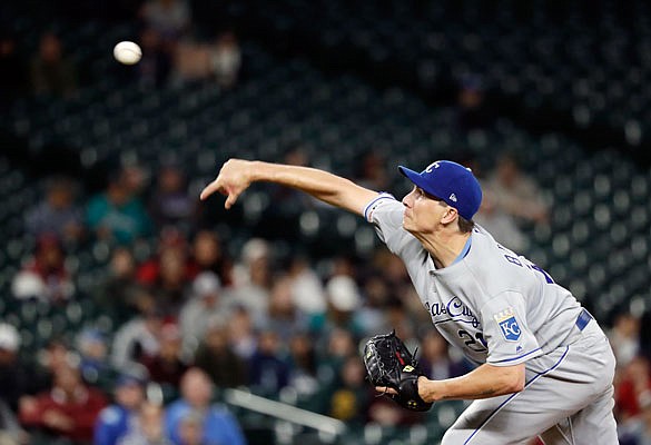Royals starting pitcher Homer Bailey throws a pitch during the sixth inning of Tuesday night's game against the Mariners in Seattle.