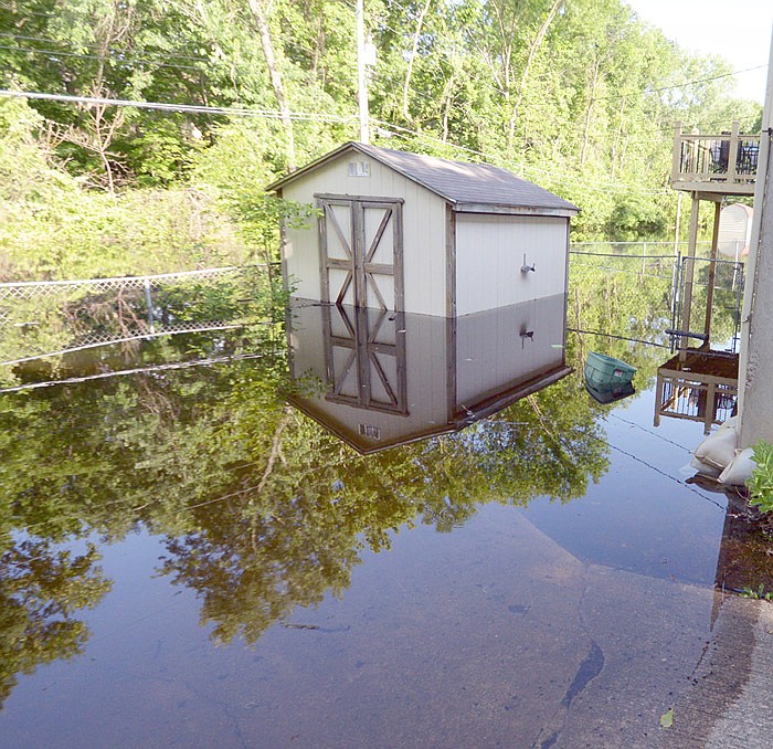 Floodwaters cover a Jefferson City residential property at 1006 Geneva Street June 5, 2019.