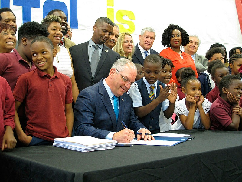 Louisiana governor signs 30B budget, touts teacher raises
