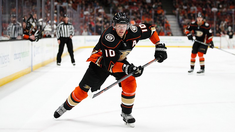 FILE - In this March 18, 2018, file photo, Anaheim Ducks' Corey Perry skates during the second period of an NHL hockey game against the New Jersey Devils, in Anaheim, Calif. The Anaheim Ducks have bought out the contract of former NHL MVP Corey Perry after 14 seasons with the franchise. The Ducks announced the move Wednesday, June 19, 2019. General manager Bob Murray called it "one of the most difficult decisions I've had to make in my 44 years in the NHL."