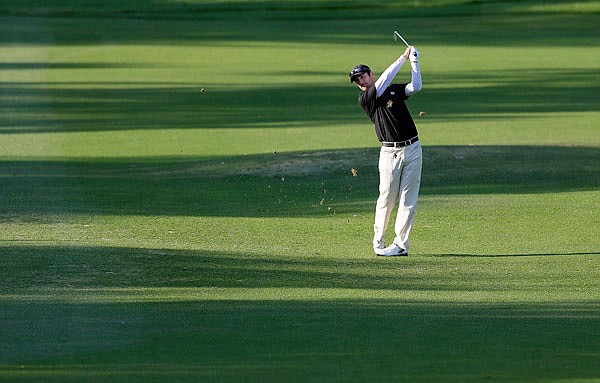 In this 2013 file photo, Andy Pope hits from the shadows in the the Tampa Bay Championship in Palm Harbor, Fla. 