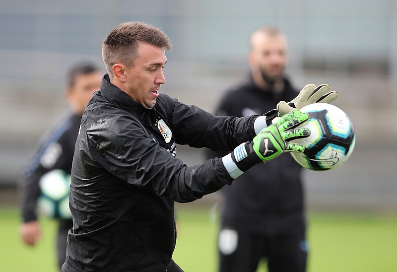 Uruguay goalkeeper Fernando Muslera catches a ball during a practice session in Porto Alegre, Brazil, Wednesday, June 19, 2019. Uruguay will face Japan tomorrow in a Copa America Group C soccer match.